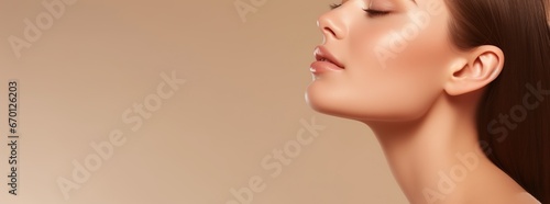 Beautiful young woman with clean fresh skin on beige background, Facial care, Facial care, Cosmetology, beauty photo