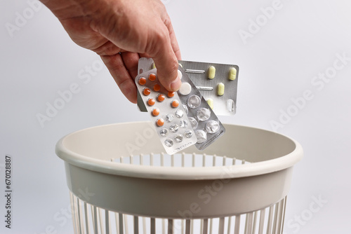 Konstfotografi Expired pills are thrown into the trash for recycling or disposal