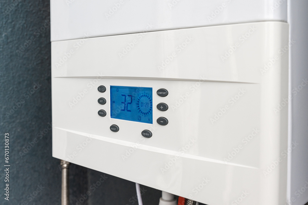 Close up of smart control panel of gas boiler for winter home heating and hot water. Modern house device Close up of smart control panel of gas boiler for winter home heating and hot water. Modern house device