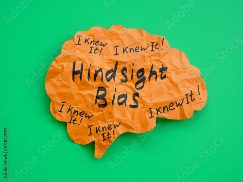 фотографія Brain made of paper with inscription Hindsight bias.