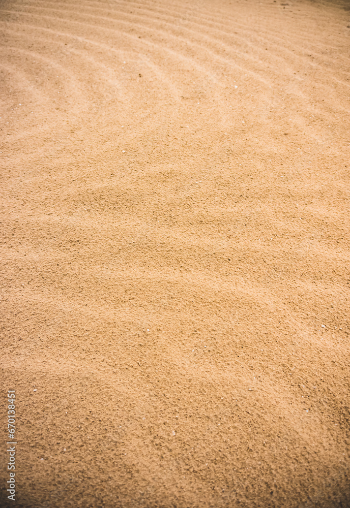 Sand texture in the desert of Uzbekistan, part of a sand dune in the steppes for a background minimalism Sand texture in the desert of Uzbekistan, part of a sand dune in the steppes for a background minimalism