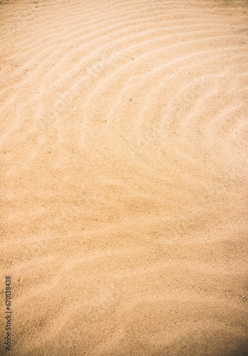 Sand texture in the desert of Uzbekistan, part of a sand dune in the steppes for a background minimalism