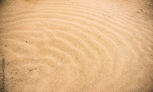 Sand texture in the desert of Uzbekistan, part of a sand dune in the steppes for a background minimalism