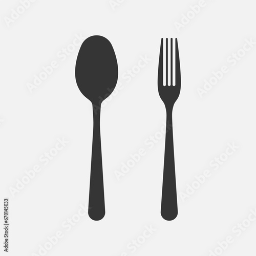 Spoon and fork icon. Vector