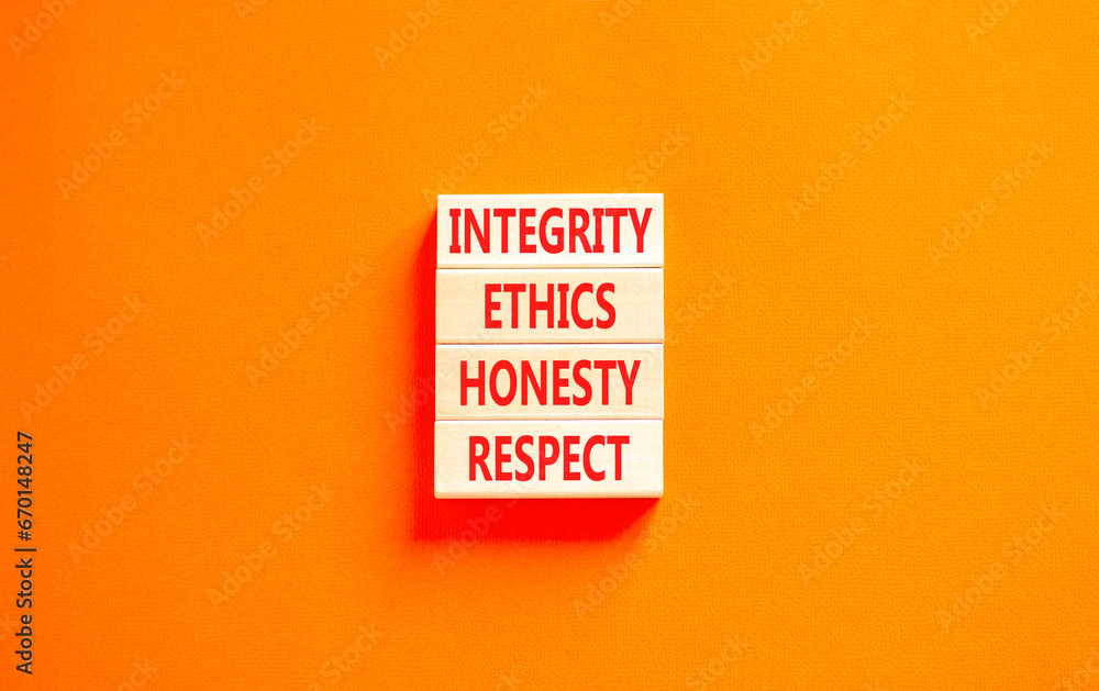 Integrity ethics honesty respect symbol. Concept word Integrity Ethics Honesty Respect on beautiful block. Beautiful orange table orange background. Business integrity ethics honesty respect concept. Integrity ethics honesty respect symbol. Concept word Integrity Ethics Honesty Respect on beautiful block. Beautiful orange table orange background. Business integrity ethics honesty respect concept.