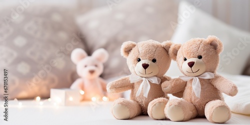 Two cute teddy bear toys sit on the clean bed lean on each other, fairy lights aside, concept of romantic relationship, valentine's day and still life.