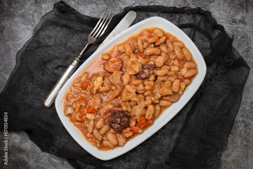 typical portuguese dish dobrada with beans in ceramic bowl