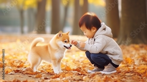 Two best friends - a boy and his dog are playing