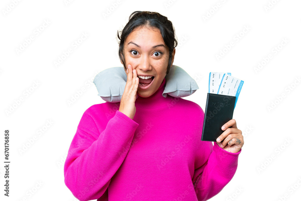 Young Uruguayan woman holding a passport over isolated chroma key background with surprise and shocked facial expression Young Uruguayan woman holding a passport over isolated chroma key background with surprise and shocked facial expression