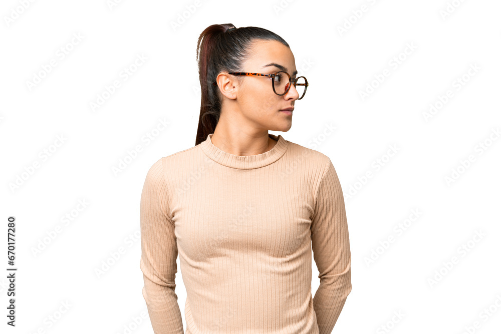Young beauty woman over isolated chroma key background looking to the side Young beauty woman over isolated chroma key background looking to the side