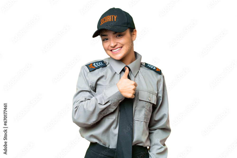 Young safeguard woman over isolated chroma key background giving a thumbs up gesture Young safeguard woman over isolated chroma key background giving a thumbs up gesture