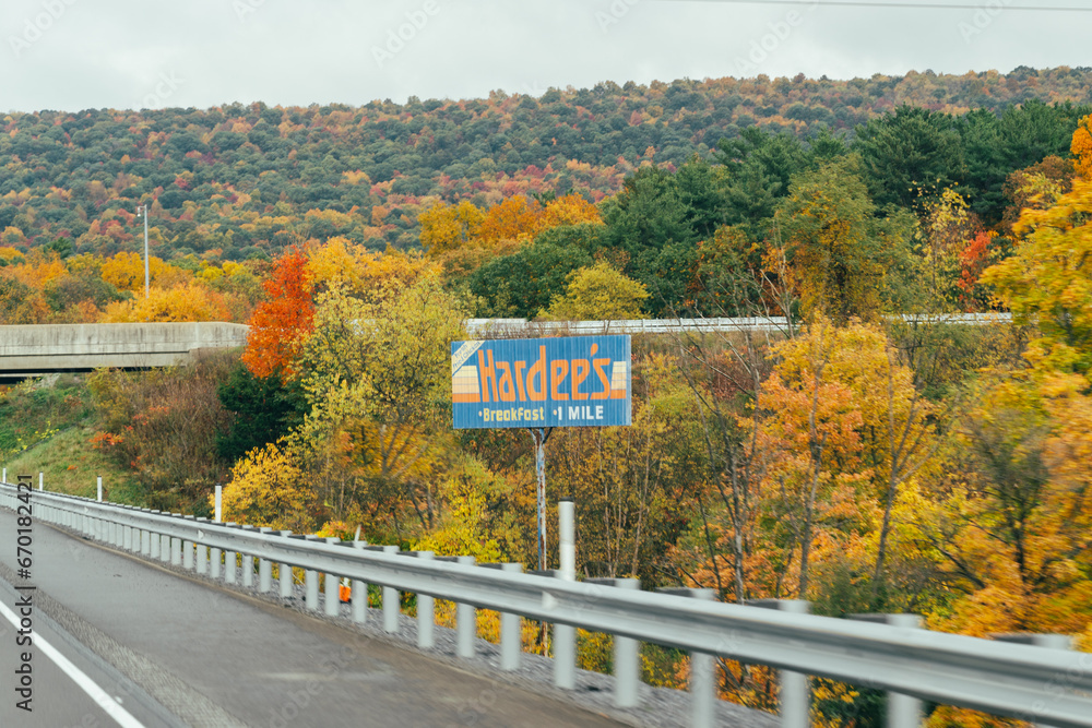 Breezewood, Pennsylvania October 20, 2023 Small retro vintage billboard for a Hardees fast