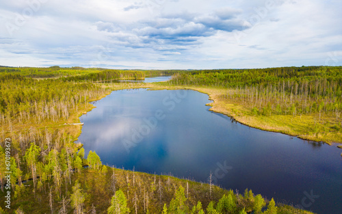 Beautiful aerial panorama of the Tuunaansalmi lake areas and boreal forests in Finland