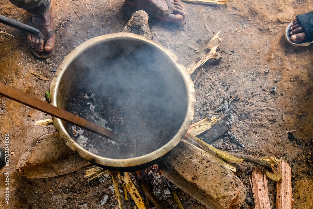 Roasting coffee beans in Chagga tribe Roasting coffee beans in Chagga tribe
