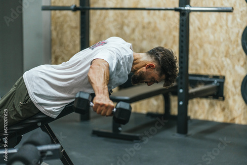 Plank intensity with dumbbells photo