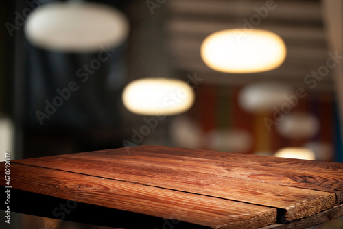 Perspective wooden table and bokeh light background. product display template