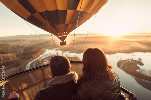 Fototapeta A hot air balloon flying, start of new fun adventure or a travel, landscape, travel with friends