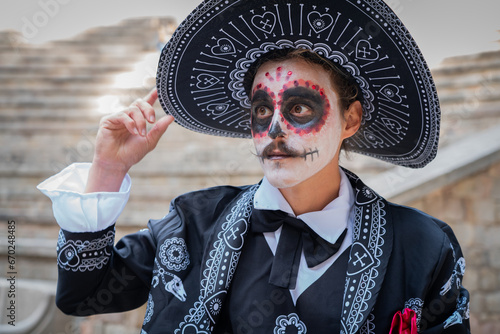 Young man dresses as catrin for day of the dead cellebration photo