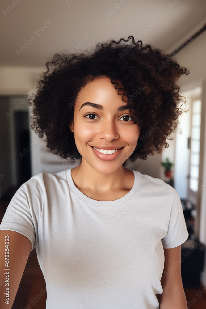 Selfie afroamerican young woman casual clothing, smile relax friendly, wearing simple clean withe t-shirt Selfie afroamerican young woman casual clothing, smile relax friendly, wearing simple clean withe t-shirt