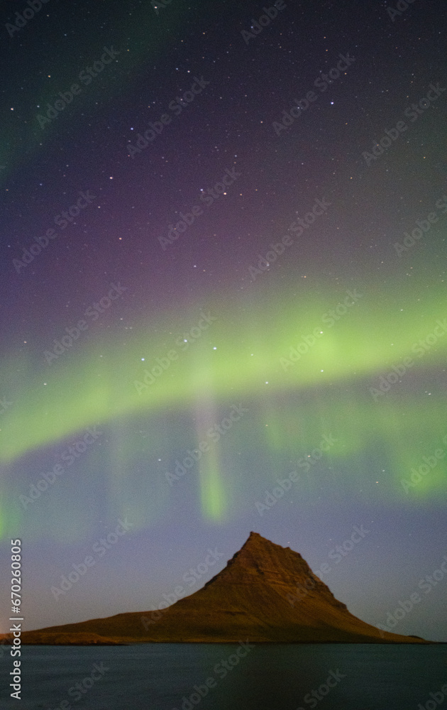aurora borealis over the mountain of Kirkjufell