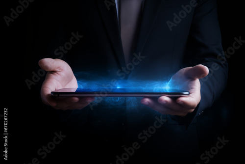 businessman holding tablet pc