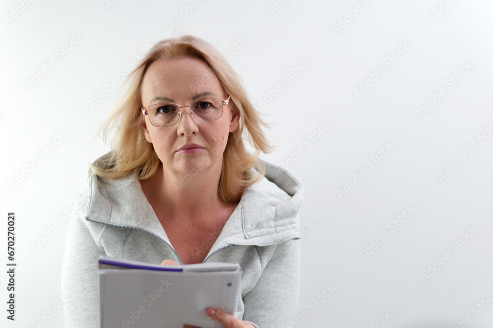 Image of woman, company worker in glasses, smiling and holding digital tablet, standing over white background. High quality photo Image of woman, company worker in glasses, smiling and holding digital tablet, standing over white background. High quality photo