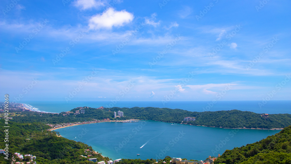 Aerial view of Puerto Marques Bay and Punta Diamante, a small bay in Acapulco city, Mexico