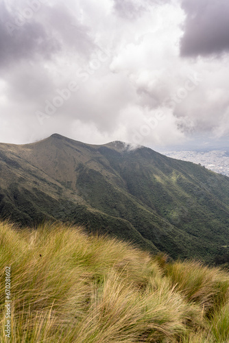 Beautiful view of the volcanoes from the top of the Pichincha volcano in the capital of Ecuador, Quito. photo