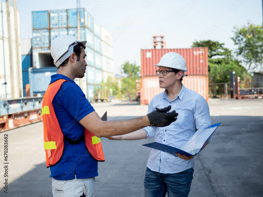 labor employment man male person people human white hardhat helmet safety talk speak discussion group two together supervisor director work job import export shipping problem file stress contract labor employment man male person people human white hardhat helmet safety talk speak discussion group two together supervisor director work job import export shipping problem file stress contract