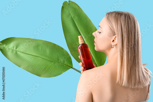 Young blonde woman with spr...