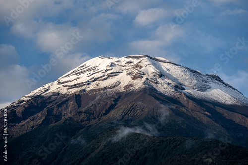 Beautiful view of the volcanoes in the city of Banos, Ecuador. Amazing sunset.