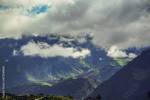 Beautiful view of the volcanoes in the city of Banos, Ecuador. Amazing sunset.