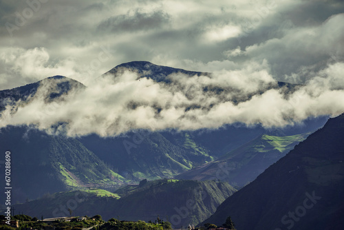 Beautiful view of the volcanoes in the city of Banos, Ecuador. Amazing sunset.