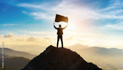 silhouette of a man and woman stands triumphantly against a cityscape and mountains, symbolizing their shared journey towards a successful, hopeful future