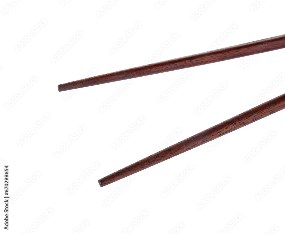 Pair of wooden chopsticks isolated on white Pair of wooden chopsticks isolated on white