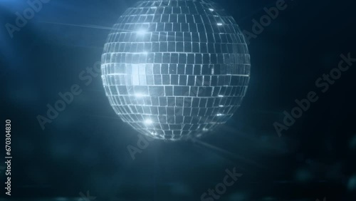 Mirror disco ball rotating, reflecting rays of light . 4k Dance Party Glitter Background.