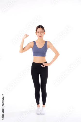 Portrait of beautiful young asian woman in sportwear showing strong muscles isolated on white background, sport and exercise for health, training and strength, female slimming with confident.