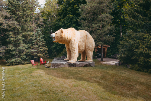 Captivating image of a giant polar bear in a suburban backyard, evoking awe and wonder. Ideal for themes of climate change, wildlife conservation, and surrealism.