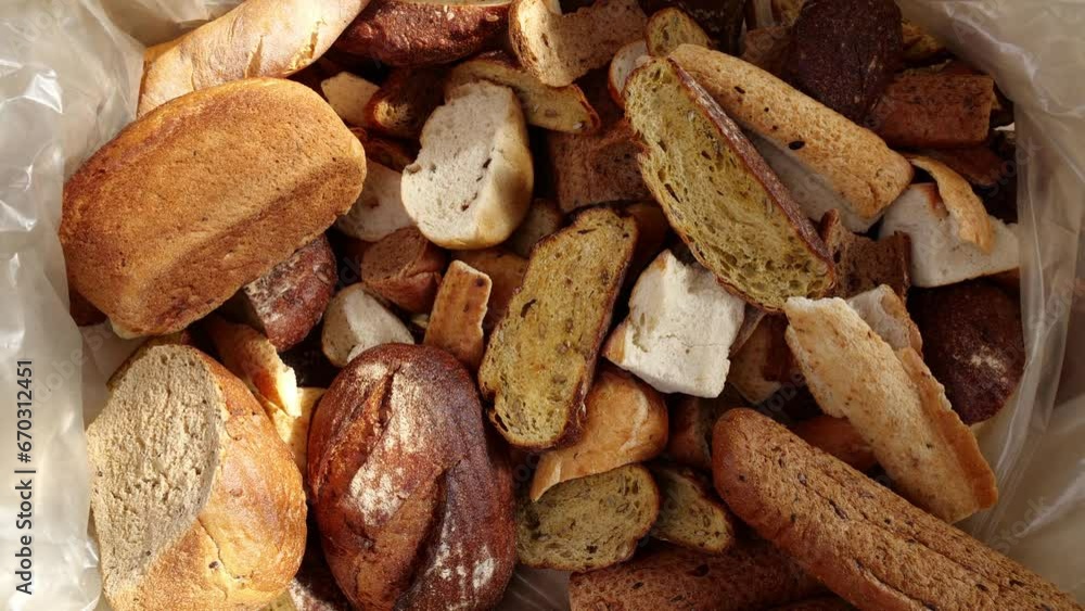 Dry uneaten bread. Circular economy of bread. Recycling bread waste. Unsold bread waste reduction Dry uneaten bread. Circular economy of bread. Recycling bread waste. Unsold bread waste reduction