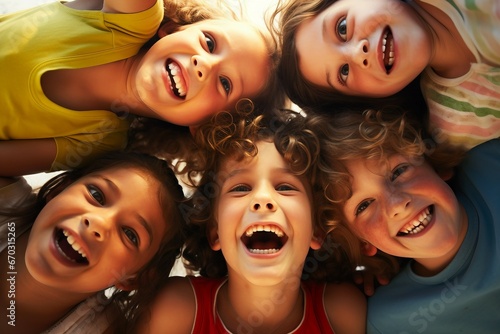concept friendship view angle low smiling camera looking huddling kids happy portrait group fun having together playing children little cute joyful cheerful bunch friends smile day hug play photo