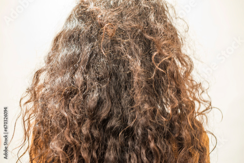 woman with long curly hair photo