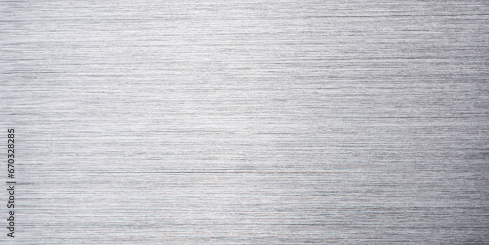 Brushed metal stainless steel texture background with reflection light Brushed metal stainless steel texture background with reflection light