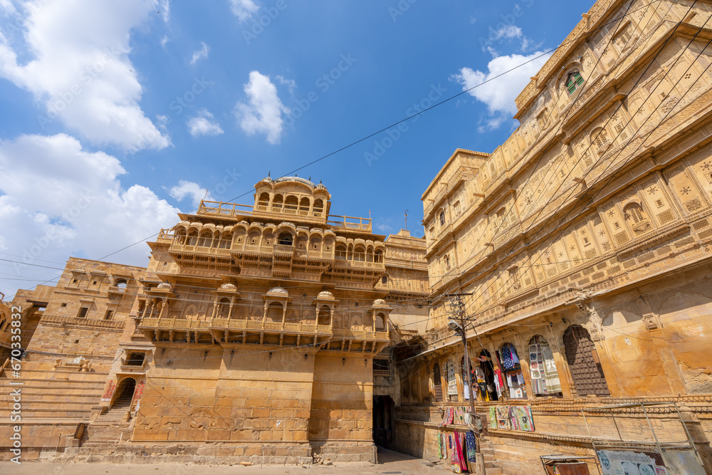 The castle is built of yellow sandstone. The streets are old and historic. Jaisalmer Fort (Sonar Quila or Golden Fort) is located in Rajasthan, India.