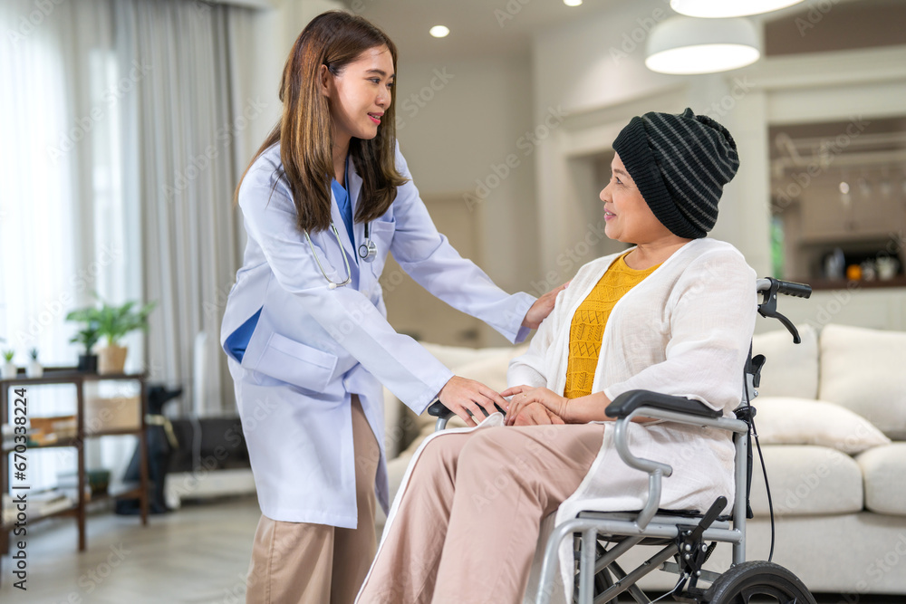 Portrait of smiling caring asian doctor service help support discussing and consulting taking care, caring, caregiver with senior elderly asian woman at home visit.senior retirement home care concept Portrait of smiling caring asian doctor service help support discussing and consulting taking care, caring, caregiver with senior elderly asian woman at home visit.senior retirement home care concept