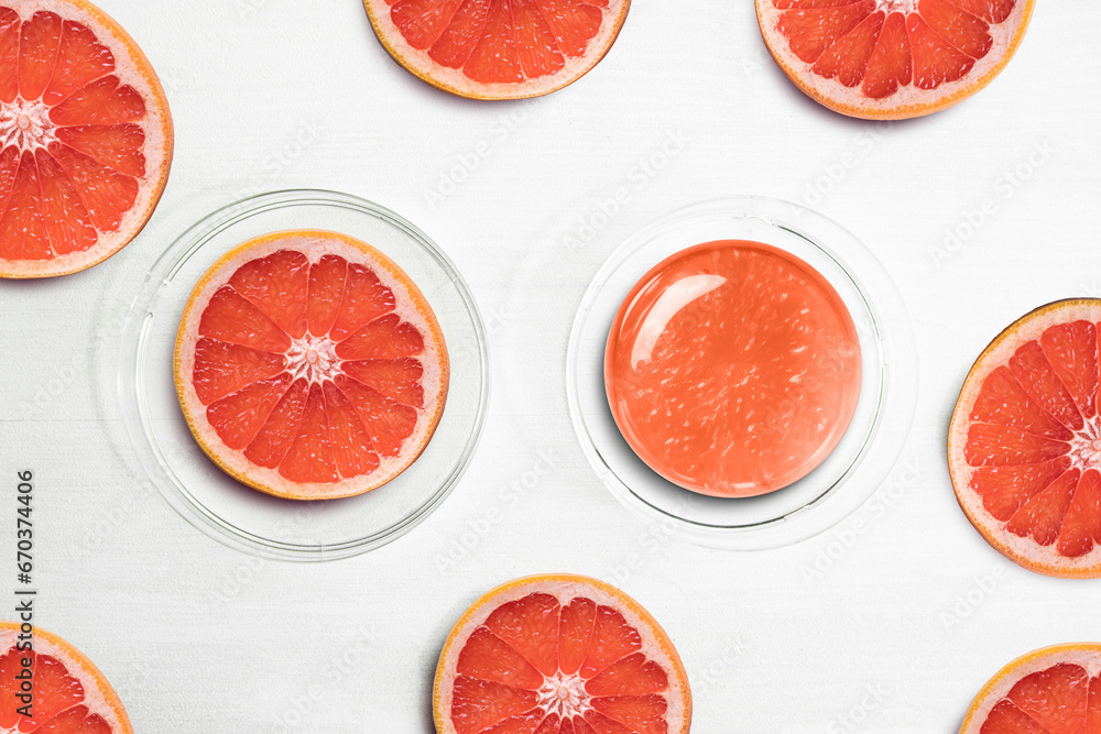 Orange Lime Slices. Serum and orange pieces on a white background, beauty. Orange Lime Slices. Serum and orange pieces on a white background, beauty.