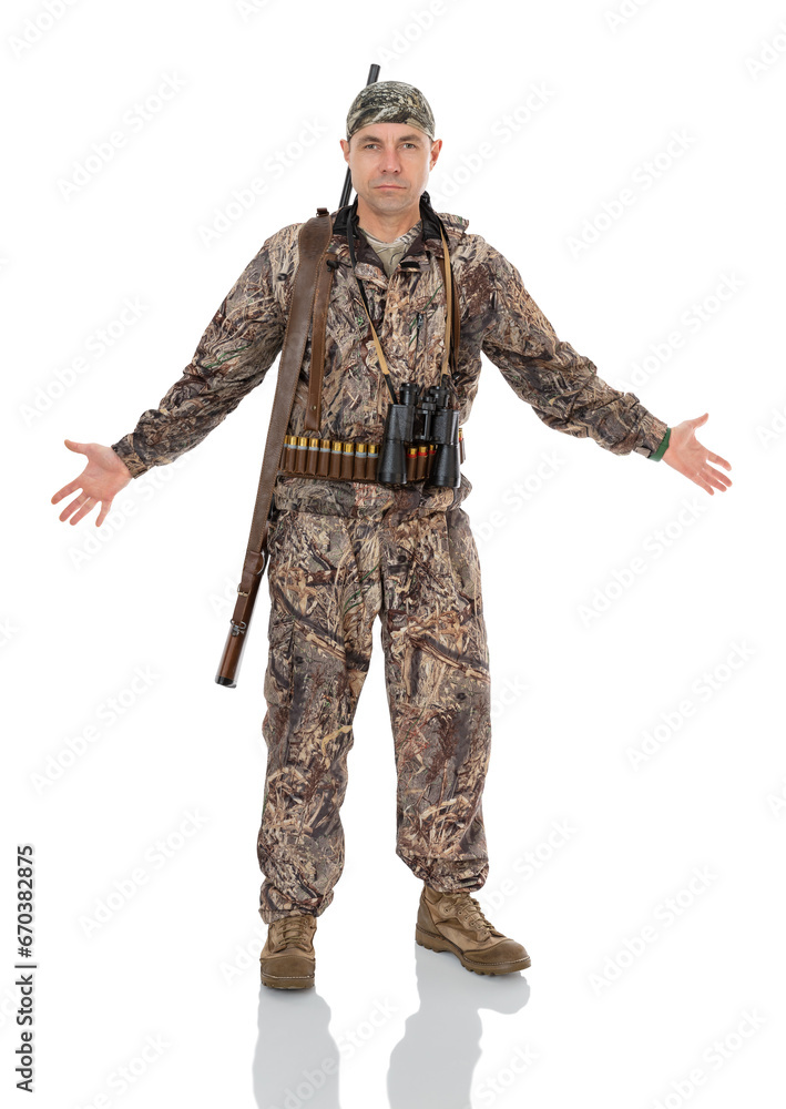 Full length portrait of duck hunter with a rifle and binoculars spread hands sideways, know nothing, can't understand something strange, looking puzzled at camera, isolated on white background.