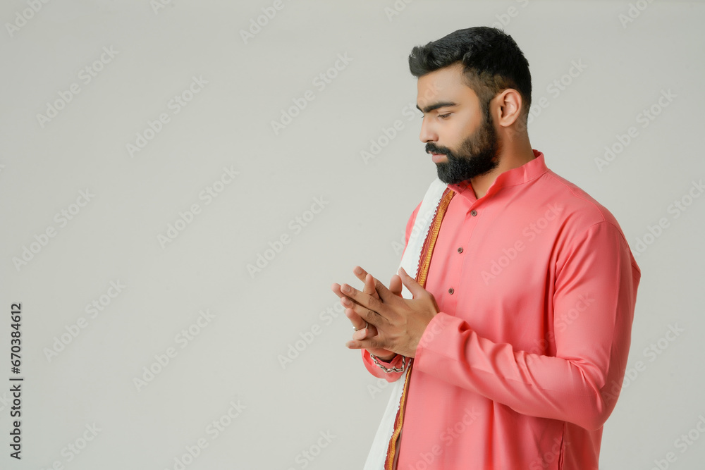 Young indian farmer giving expression on white background. Young indian farmer giving expression on white background.