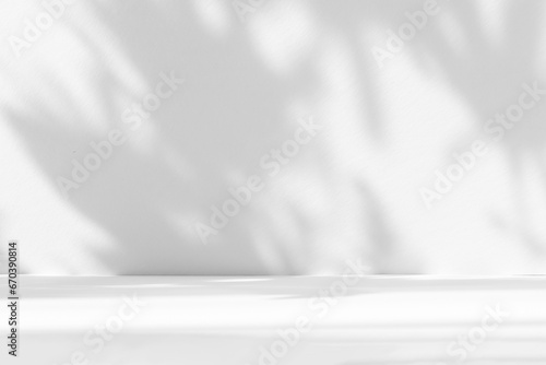 Fototapeta Naklejka Na Ścianę i Meble -  Abstract white studio background for product presentation. Empty room with shadows of window and flowers and palm leaves . 3d room with copy space. Summer concert. Blurred backdrop.