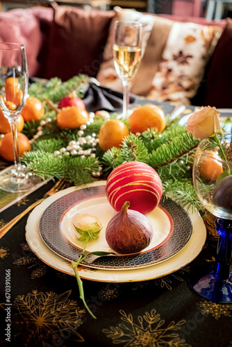 Christmas table with fresh mandarins