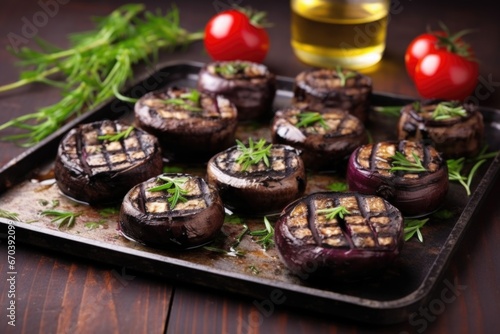 grilled portobello caps arranged on a dark stone tray